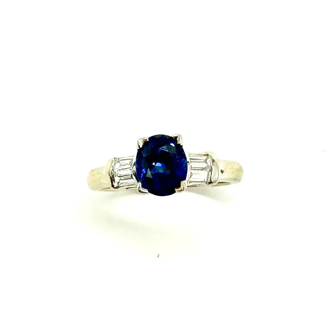 1.34 CTW Oval Sapphire W/ 50 PTW Diamond Ring