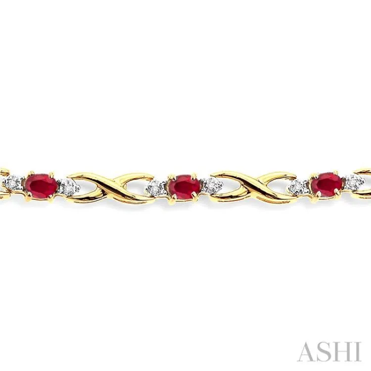 4x3 MM Oval Cut Ruby and 1/10 Ctw Single Cut Diamond Bracelet in 10K Yellow Gold