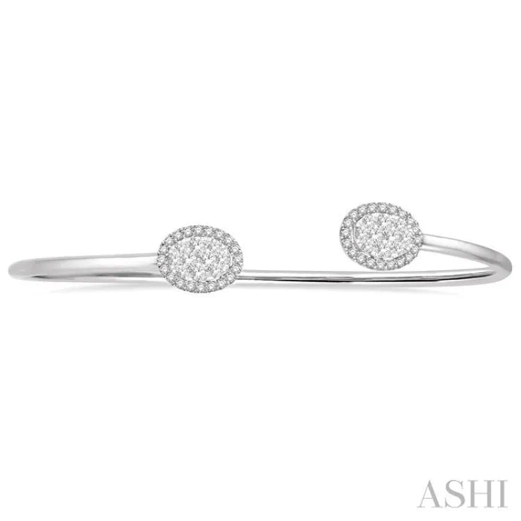 5/8 Ctw Oval Shape Lovebright Open Cuff Diamond Bangle in 14K White Gold