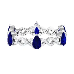 Blue Sapphire and Diamond Crossover Eternity Ring