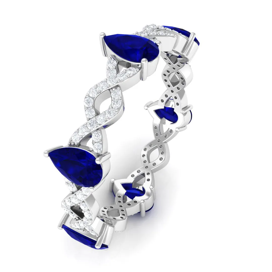 Blue Sapphire and Diamond Crossover Eternity Ring