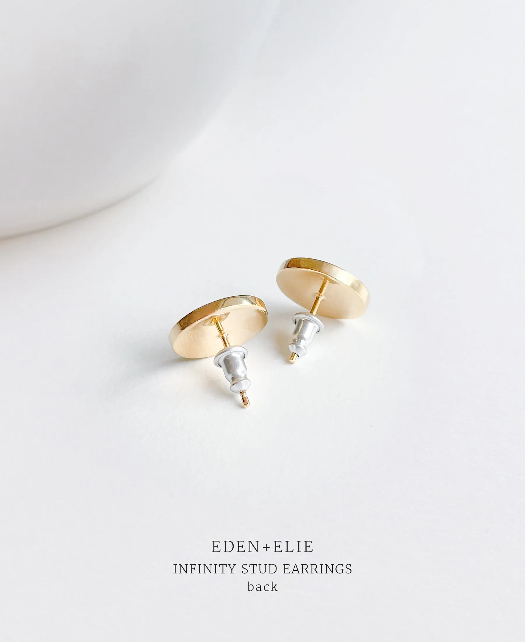 EDEN   ELIE Infinity stud earrings - dew