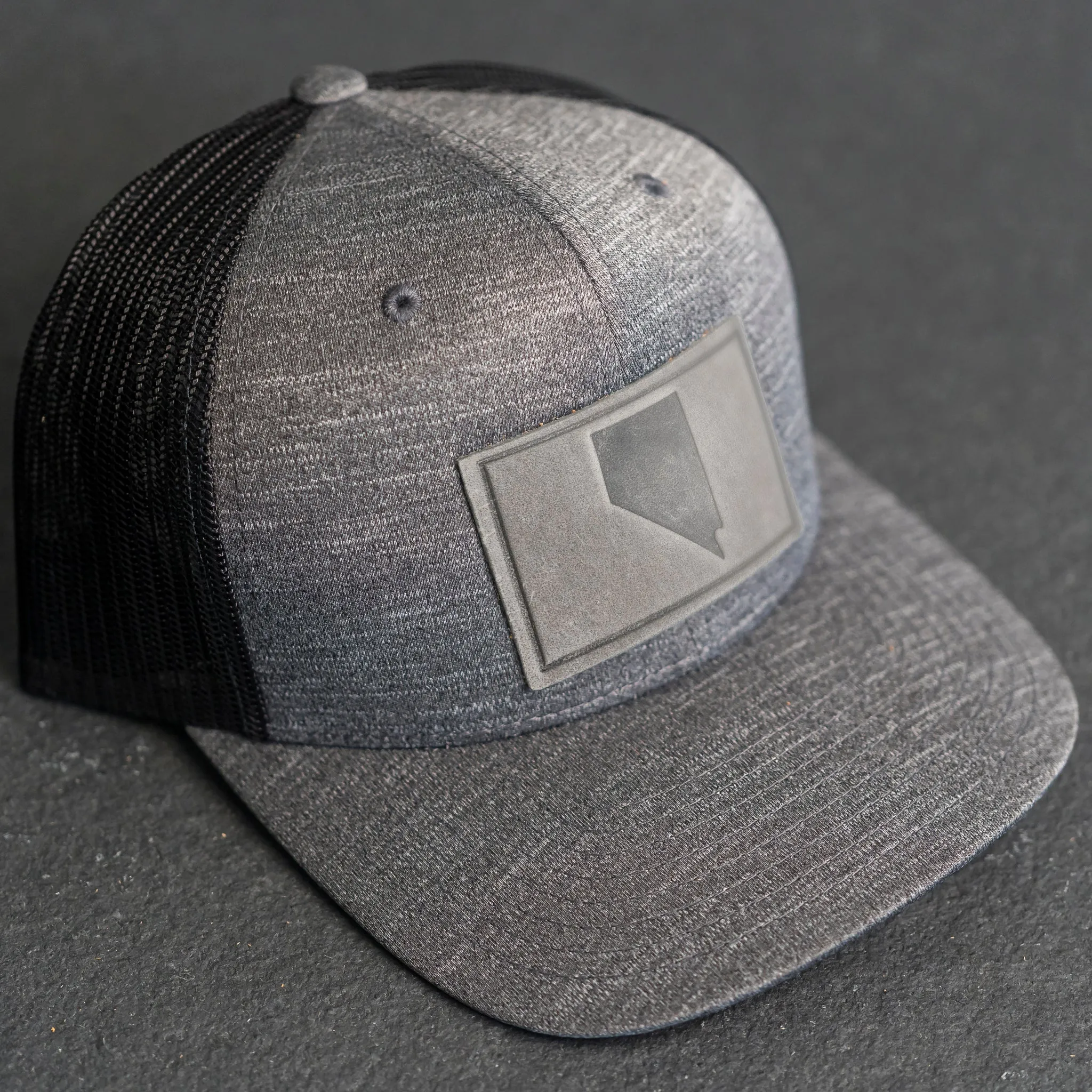 Leather Patch Performance Style Trucker Hat - Nevada Stamp